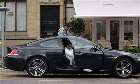 Cristiano Ronaldo leaving his car, a BMW M6