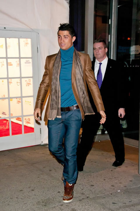 Cristiano Ronaldo fashion in jeans, white shirt and brown jacket