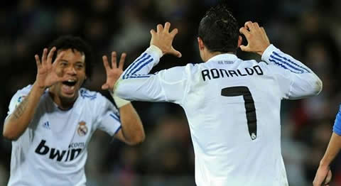 Cristiano Ronaldo and Marcelo doing the claw celebration after another goal for Real Madrid in 2010/2011