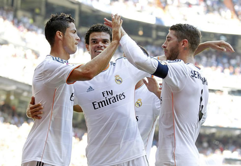Cristiano Ronaldo celebrating Real Madrid goal with hairy Pepe and Sergio Ramos, in 2013-2014