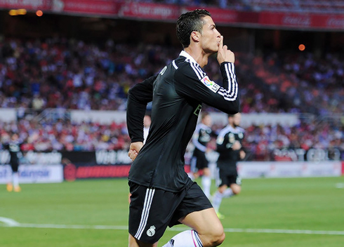 Cristiano Ronaldo silencing the fans at the Sánchez Pizjuán, after another Real Madrid goal