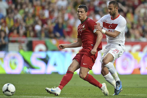 Cristiano Ronaldo striking the ball with his right foot, in Portugal vs Turkey, just before the EURO 2012 debut
