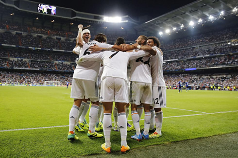 Real Madrid players showing their unity in Real Madrid goal celebration in Champions League 2013-2014