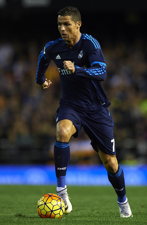 Cristiano Ronaldo racing forward in Real Madrid's blue jersey for 2015-2016