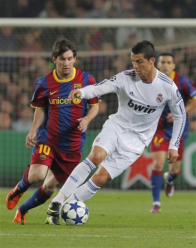 Cristiano Ronaldo hiding the ball from Messi