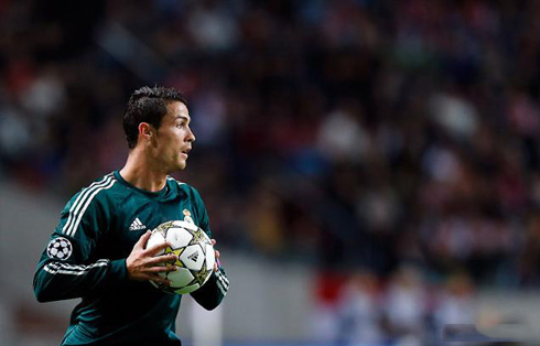 Cristiano Ronaldo in a rare moment, as he prepares to make a throw-in in Ajax vs Real Madrid, in the Champions League 2012-2013