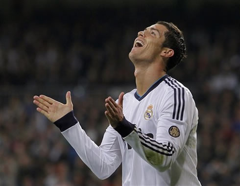 Cristiano Ronaldo ironic smile as he looks to the sky in a game for Real Madrid against Zaragoza, in La Liga 2012-2013