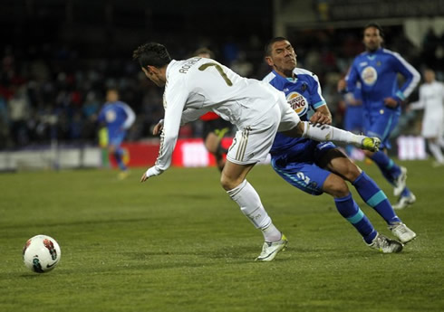 Cristiano Ronaldo getting hit and going down, in Getafe vs Real Madrid