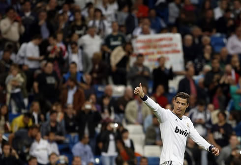 Cristiano Ronaldo putting his thumbs up as a sign of approval, during a Real Madrid game in 2013