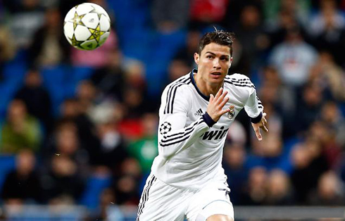 Cristiano Ronaldo chasing the UEFA Champions League ball, in a game for Real Madrid in the 2012-2013 campaign