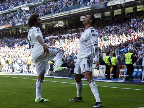 Cristiano Ronaldo and Marcelo celebrating a Real Madrid goal in style