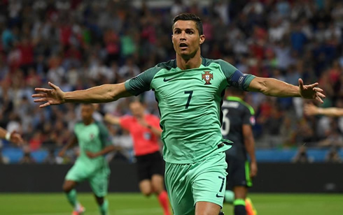 Cristiano Ronaldo running to his teammates on the sideline, after scoring the opener in Portugal vs Wales for the EURO 2016