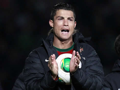 Cristiano Ronaldo taking the hat-trick ball home, after Northern Ireland vs Portugal, in 2013