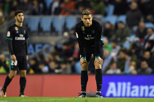 Cristiano Ronaldo bends down after Real Madrid concedes another goal in Vigo