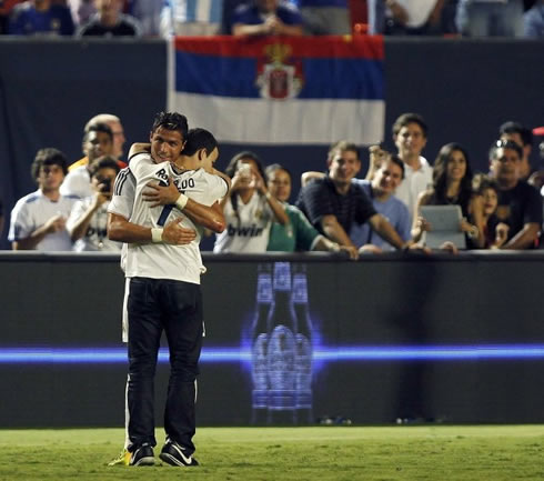 Cristiano Ronaldo hugging a fan that had just invaded the pitch in the US, in Real Madrid vs Chelsea and holding him on his arms, in 2013