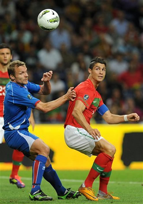 Cristiano Ronaldo looks behind as the ball escapes his vision area