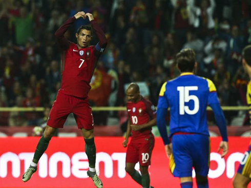 Cristiano Ronaldo jumps to perform his goal celebration in Portugal 6-0 Andorra