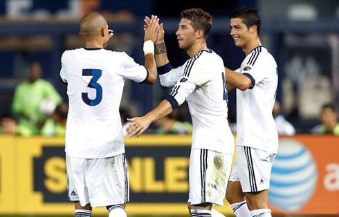 Pepe, Sergio Ramos and Cristiano Ronaldo celebrating a goal together, in the 2012-2013 pre-season tour