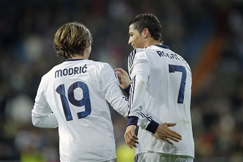 Luka Modric putting his hand on Cristiano Ronaldo ass, during a game for Real Madrid in 2013