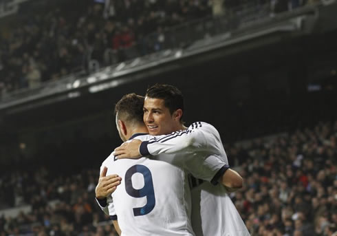 Cristiano Ronaldo friendship hug to Karim Benzema, after scoring another goal for Real Madrid against Celta de Vigo, in the Copa del Rey 2012-2013