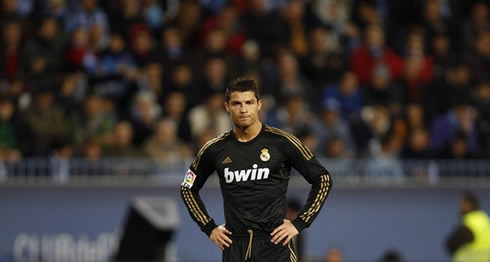 Cristiano Ronaldo with his hands on his hips, looking frustrated in Real Madrid 2011-2012