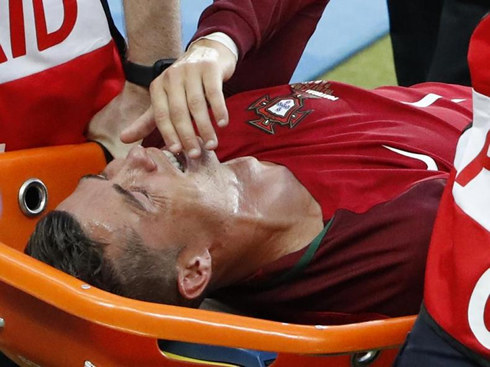 Cristiano Ronaldo crying on the stretcher as he gets taken off the pitch in Portugal vs France for the EURO 2016 final