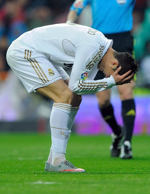 Cristiano Ronaldo puts his hands on his head in despair after Real Madrid got defeated against Barcelona