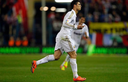 Cristiano Ronaldo starts running away from the free-kick spot, after scoring an incredible long range goal in Atletico Madrid 1-4 Real Madrid