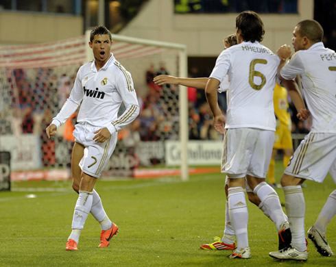 Cristiano Ronaldo showing his right leg muscles after scoring a goal in Atletico Madrid vs Real Madrid, in 2012