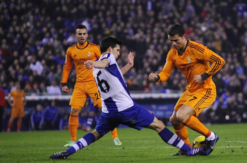 Cristiano Ronaldo being disarmed when trying to get past a defender from Espanyol, in a league game for Real Madrid