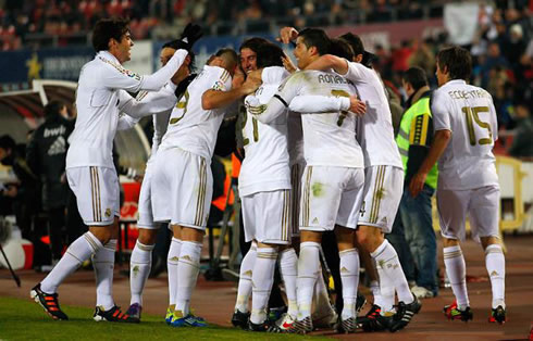 Real Madrid players happy as they celebrate the winning goal against Mallorca, for La Liga in 2011-2012