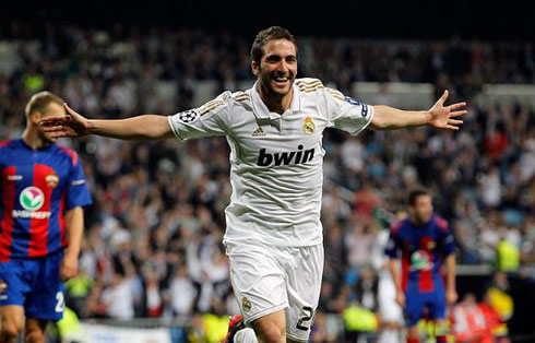 Gonzalo Higuaín running to celebrate a goal he just scored for Real Madrid against CKSA Moscow, in the UEFA Champions League