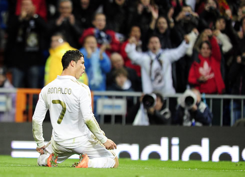 Cristiano Ronaldo goal celebration in Real Madrid vs Sporting Gijon, sliding on his knees towards the crowd, in 2012