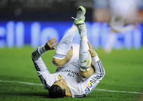 Cristiano Ronaldo rolling on his back, during a game for Real Madrid