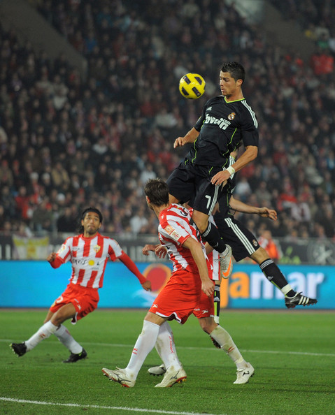 Cristiano Ronaldo holds on the air