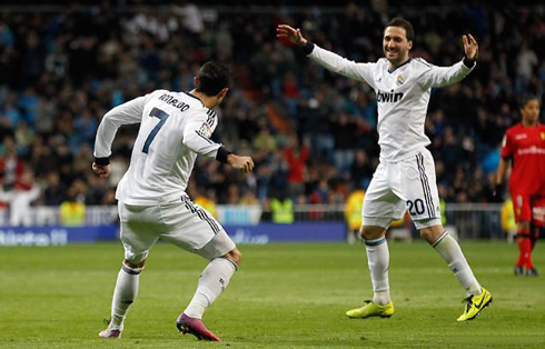 Cristiano Ronaldo and Gonzalo Higuaín celebrating Real Madrid goal against Mallorca, in 2012-2013