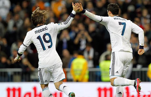 Cristiano Ronaldo running back to Real Madrid half, with Luka Modric by his side, in a game at the Bernabéu against Espanyol for La Liga 2012-2013