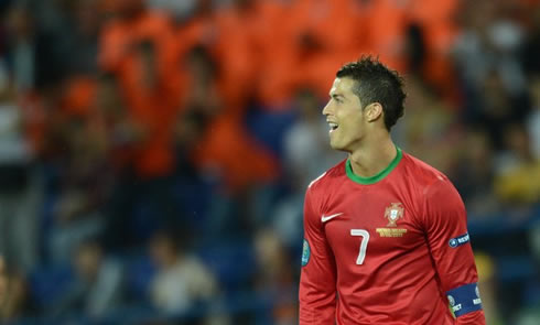 Cristiano Ronaldo smiling during a moment in the game between Portugal and the Netherlands, at the EURO 2012