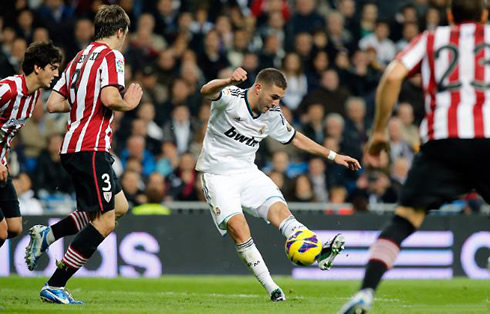 Karim Benzema curling the ball with a left-foot shot, in Real Madrid 5-1 Athletic Bilbao, for La Liga 2012-2013