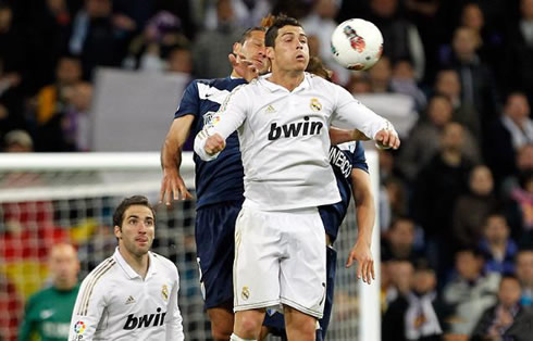 Cristiano Ronaldo making a funny face when jumping to head a ball in Real Madrid vs Malaga