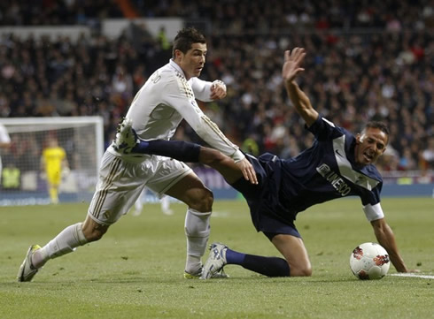 Cristiano Ronaldo knocks down an opponent from Malaga