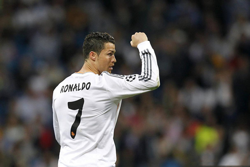 Cristiano Ronaldo showing his strength by raising his right fist