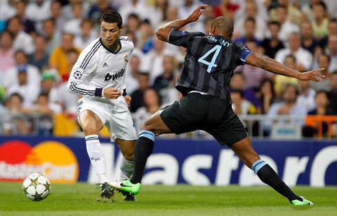 Cristiano Ronaldo dribbling Vincent Kompany, in Real Madrid 3-2 Manchester City, for the UEFA Champions League debut in 2012-2013