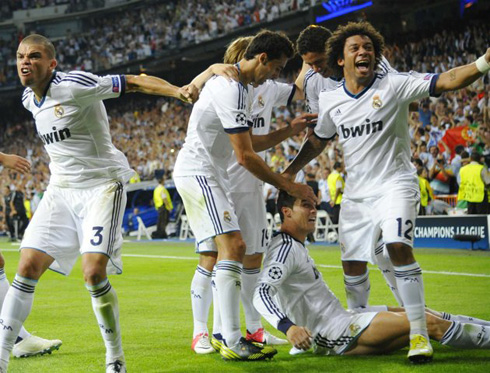 Real Madrid players celebrating all together Ronaldo goal and winner against Manchester City, in the UEFA Champions League 2012-2013