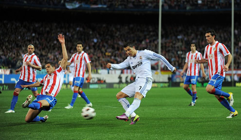 Cristiano Ronaldo shooting the ball