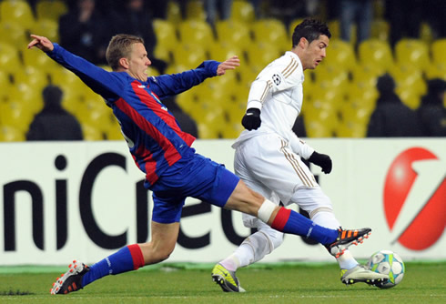 Cristiano Ronaldo being taclked from behind, in a game between CSKA Moscow and Real Madrid, in 2012