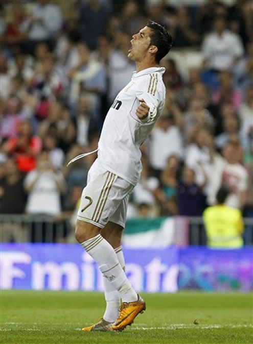 Cristiano Ronaldo happy and celebrating with his arms wide open in the Santiago Bernabéu in La Liga 2011/2012