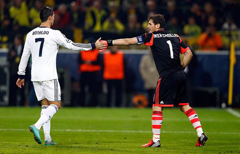 Cristiano Ronaldo touching hands with Iker Casillas during the match between Borussia Dortmund and Real Madrid for the UCL 2012-2013