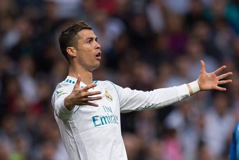 Cristiano Ronaldo makes a gesture to indicate a large gap