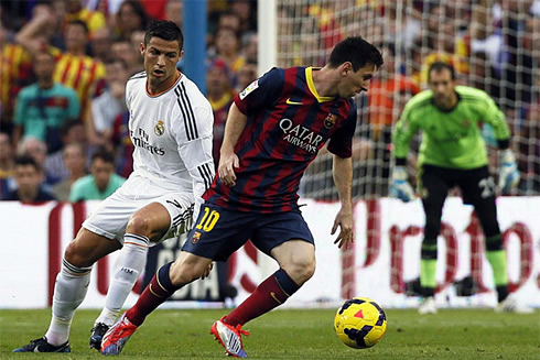 Cristiano Ronaldo chasing Lionel Messi, in a Cam Nou Clasico Barcelona vs Real Madrid, for La Liga 2013-2014